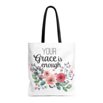 White tote with black handles, floral artwork, and Your Grace Is Enough lettering